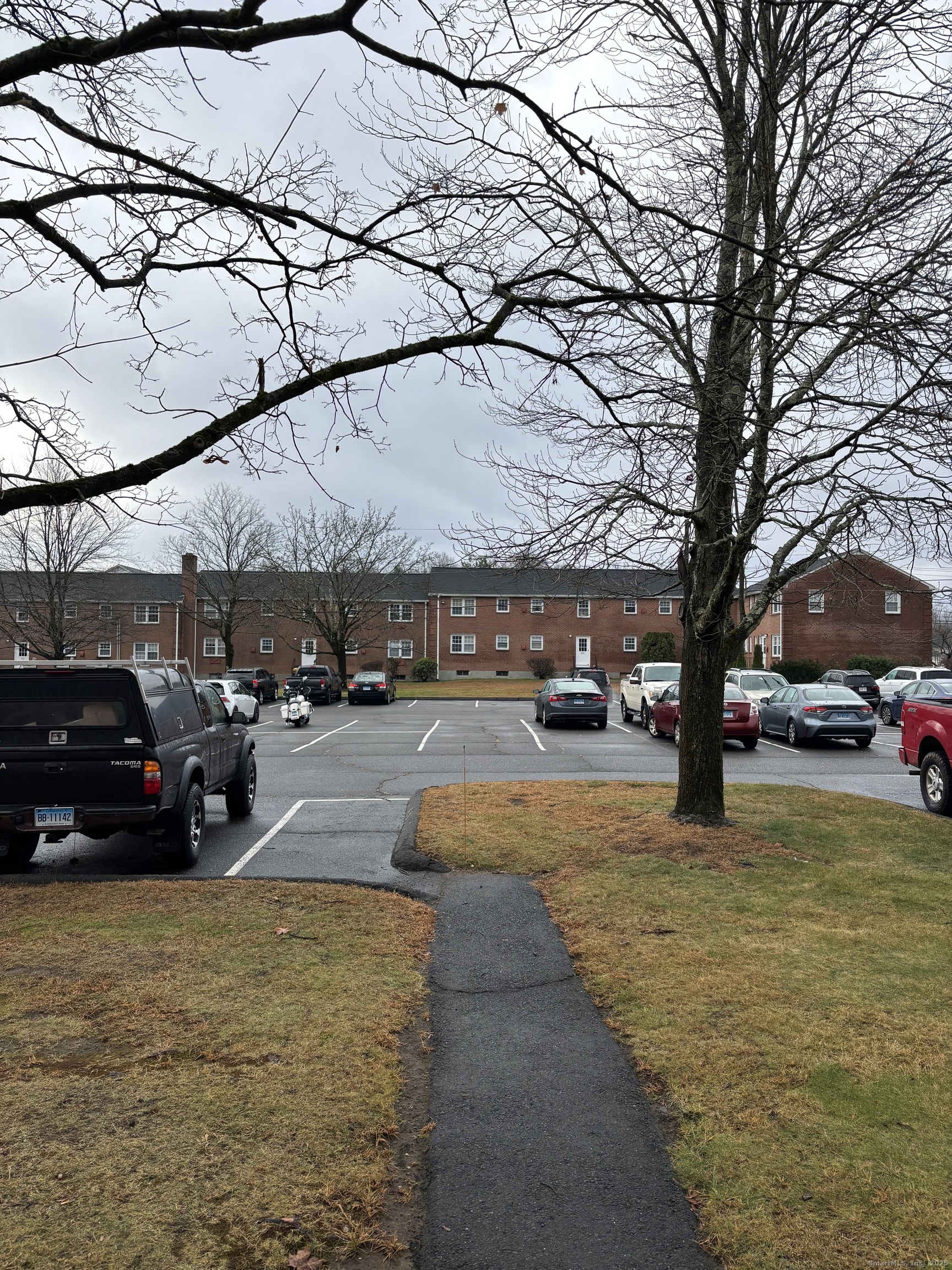 49 Grandview Drive, Unit A Farmington, CT 06032 - Photo 18 of 18 a view of a street with cars