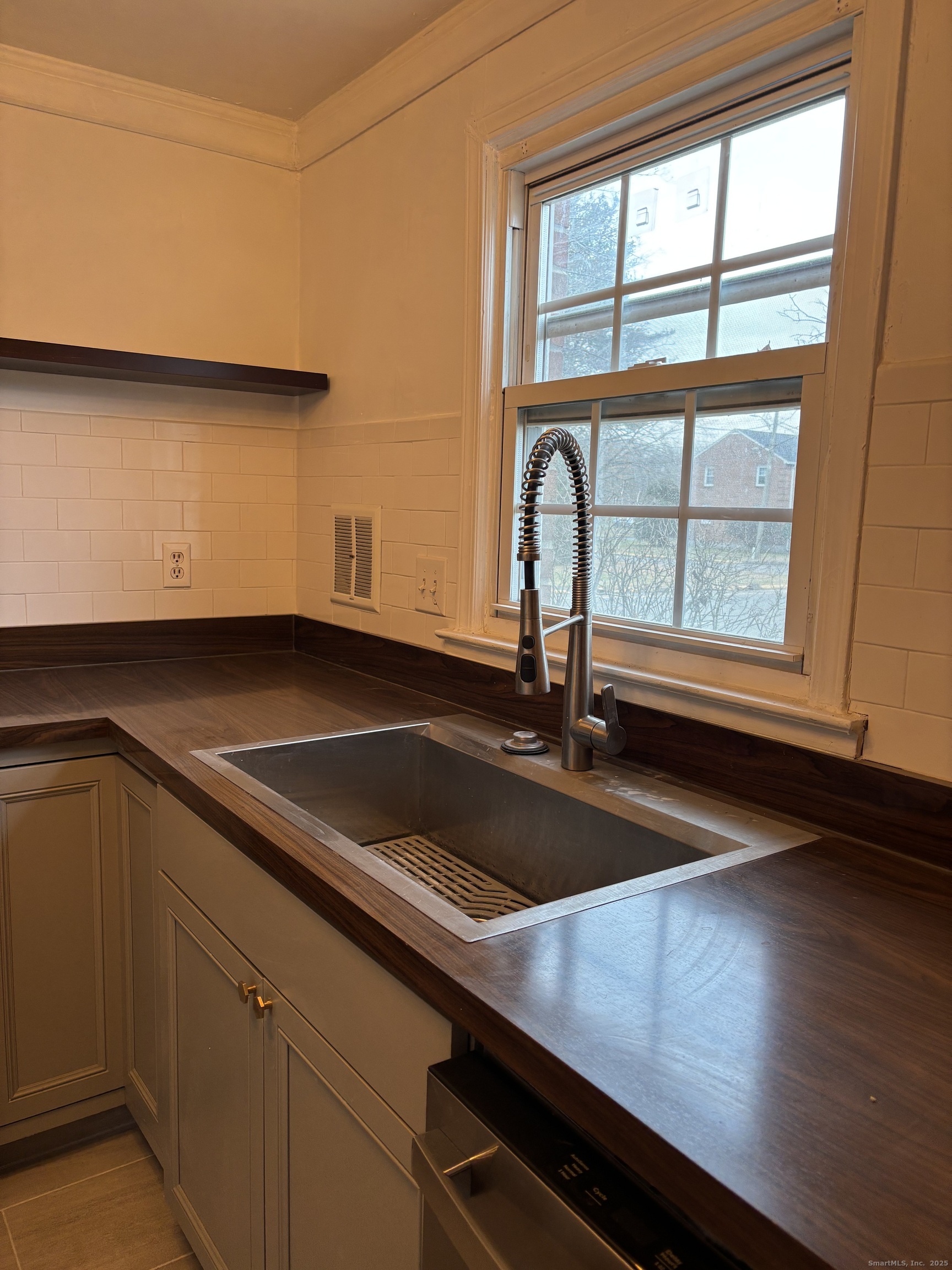 49 Grandview Drive, Unit A Farmington, CT 06032 - Photo 3 of 18 a kitchen with a sink and a window