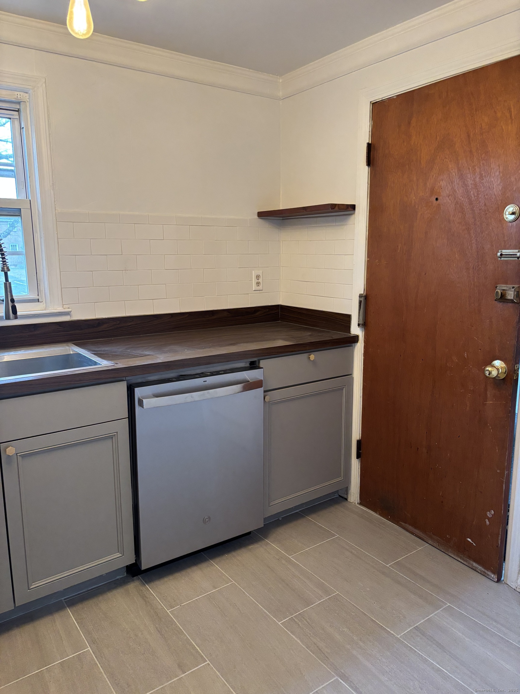 49 Grandview Drive, Unit A Farmington, CT 06032 - Photo 4 of 18 a kitchen with a sink and cabinets