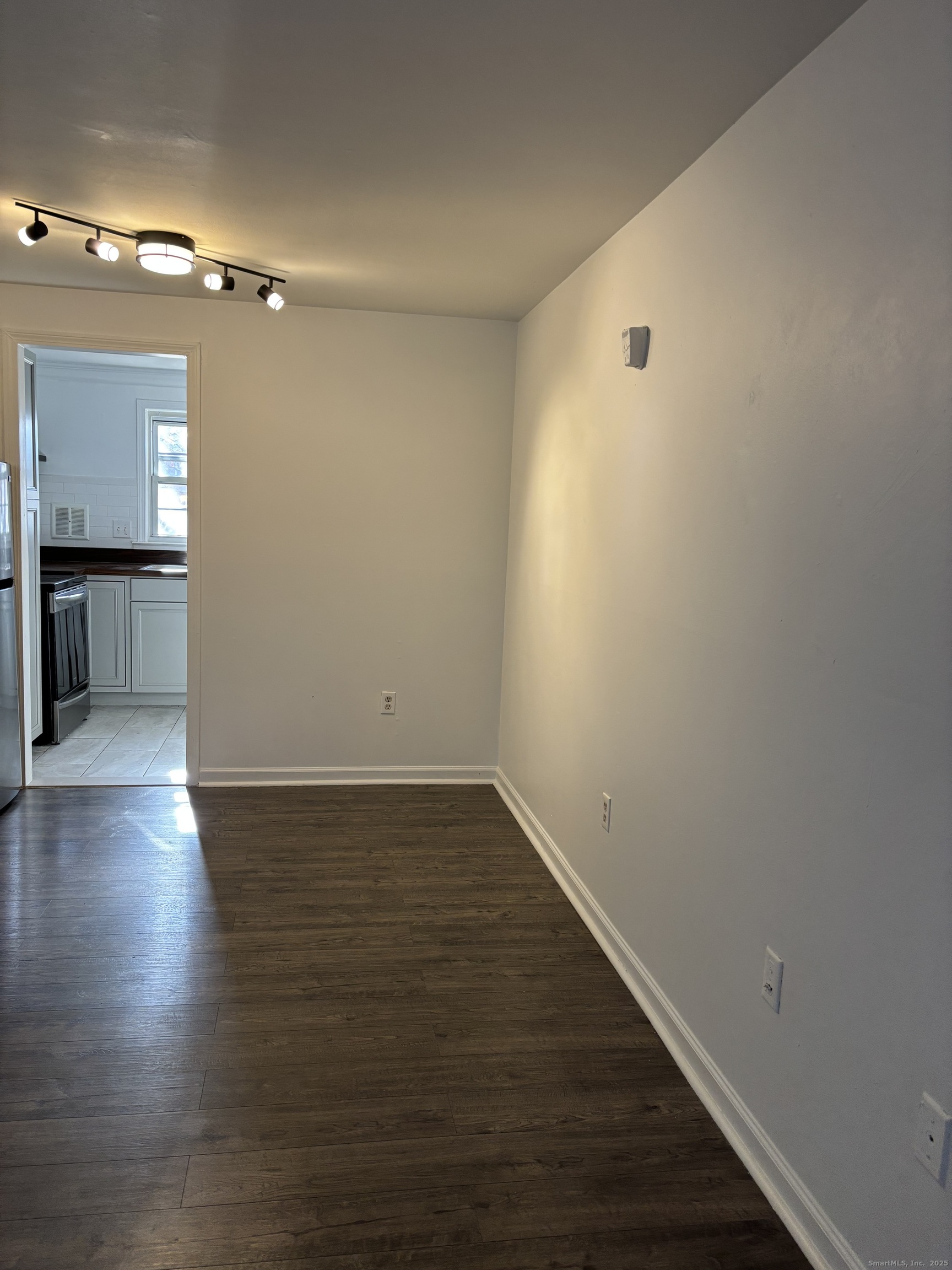 49 Grandview Drive, Unit A Farmington, CT 06032 - Photo 8 of 18 wooden floor in an empty room with a window