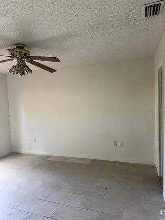 a view of a room with an empty space