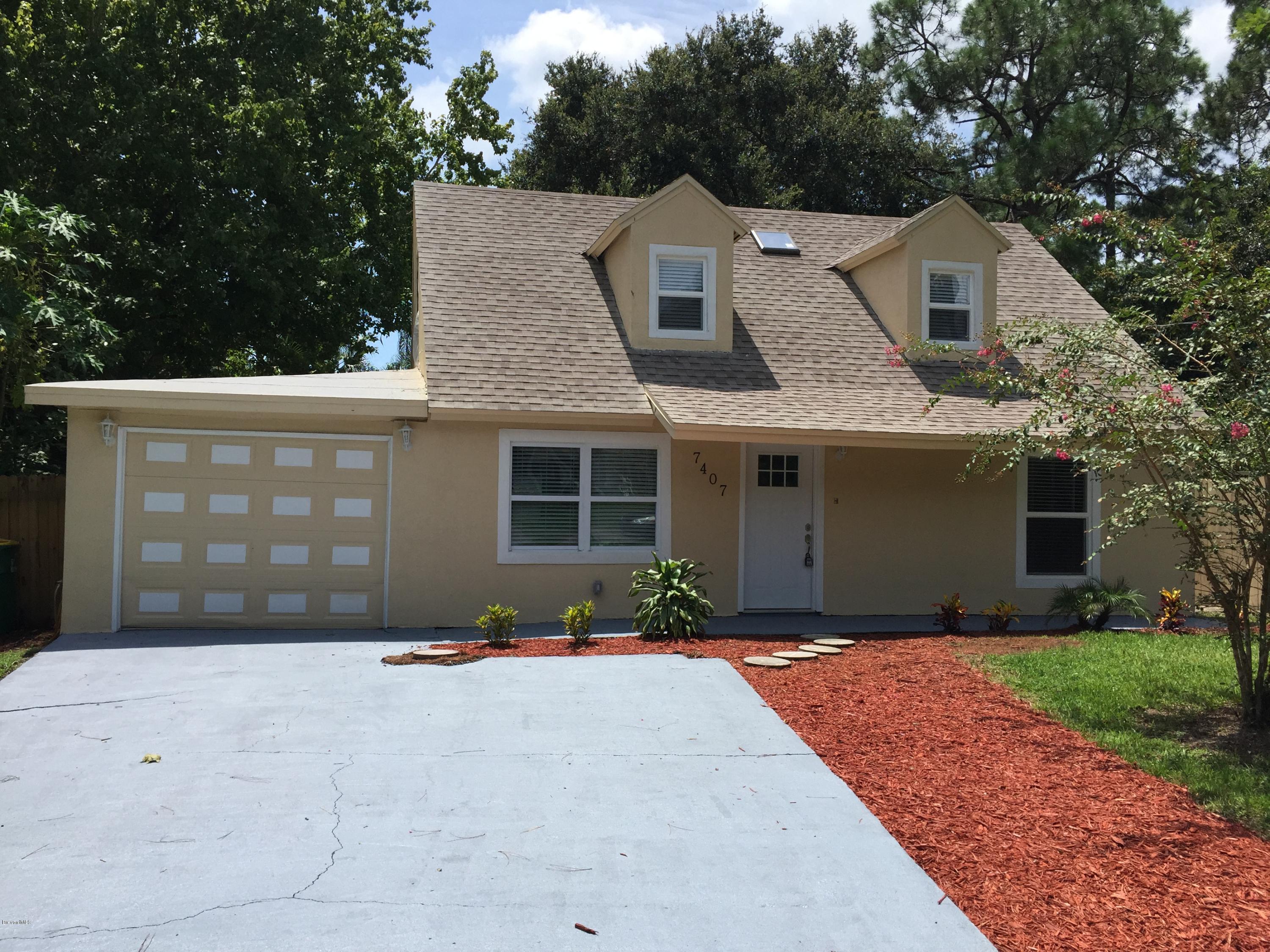7407 Ester Road Cocoa, FL 32927 - Photo 1 of 31 front