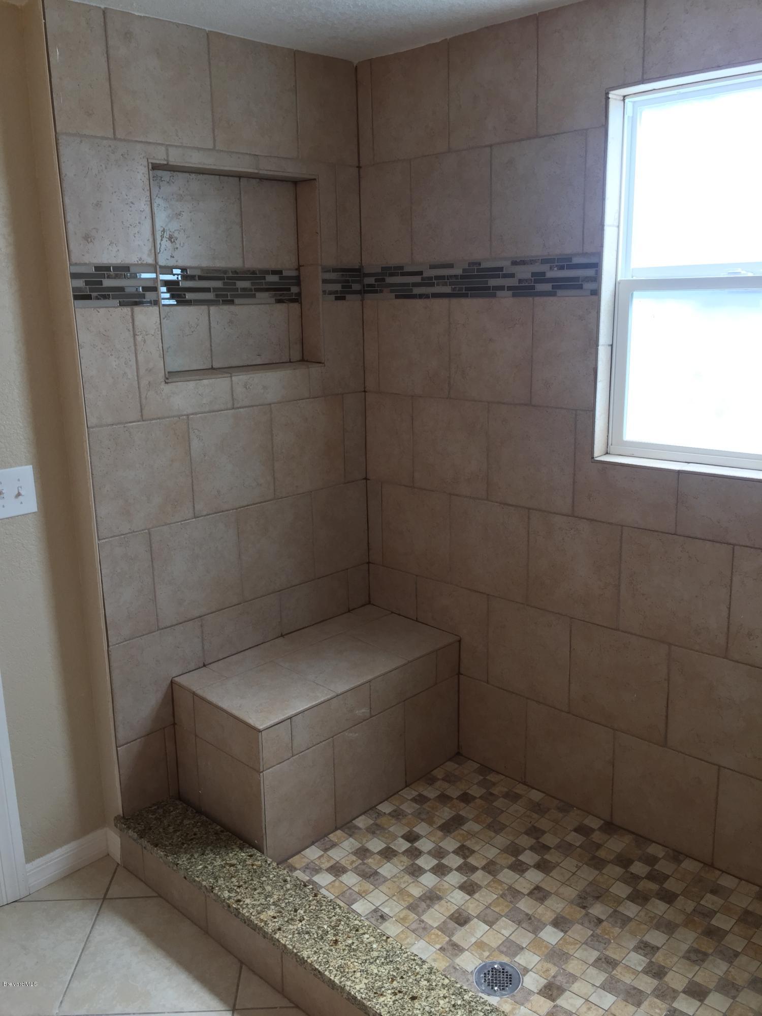7407 Ester Road Cocoa, FL 32927 - Photo 11 of 31 Master bathroom shower 2nd view