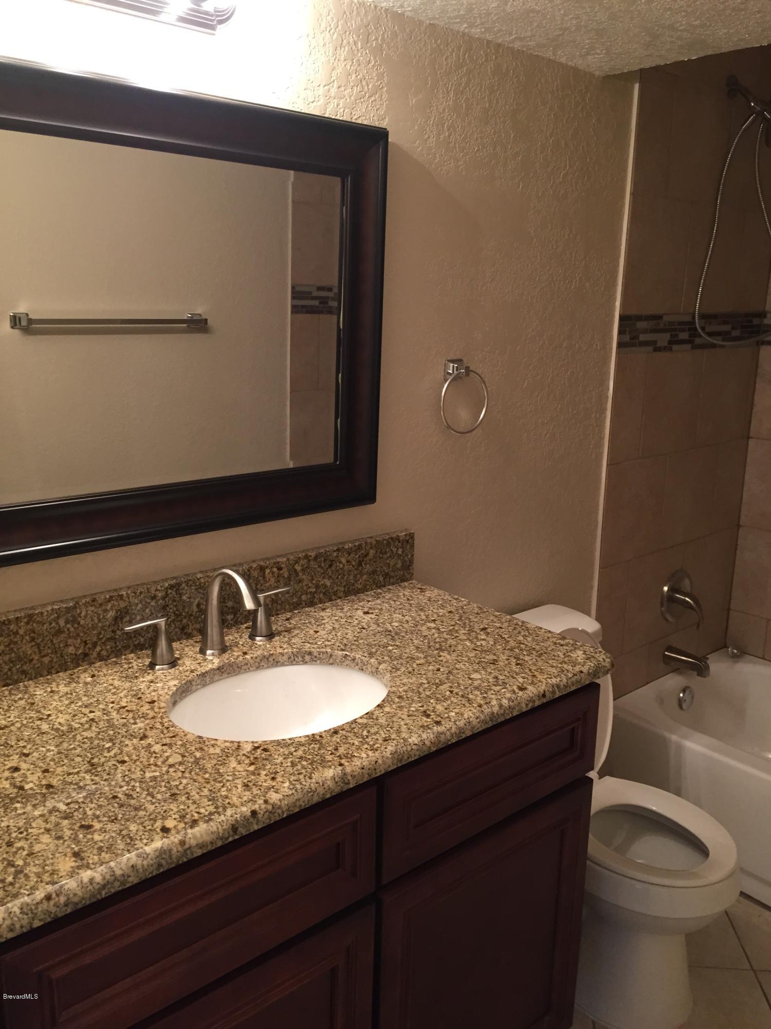 7407 Ester Road Cocoa, FL 32927 - Photo 14 of 31 Guest bathroom