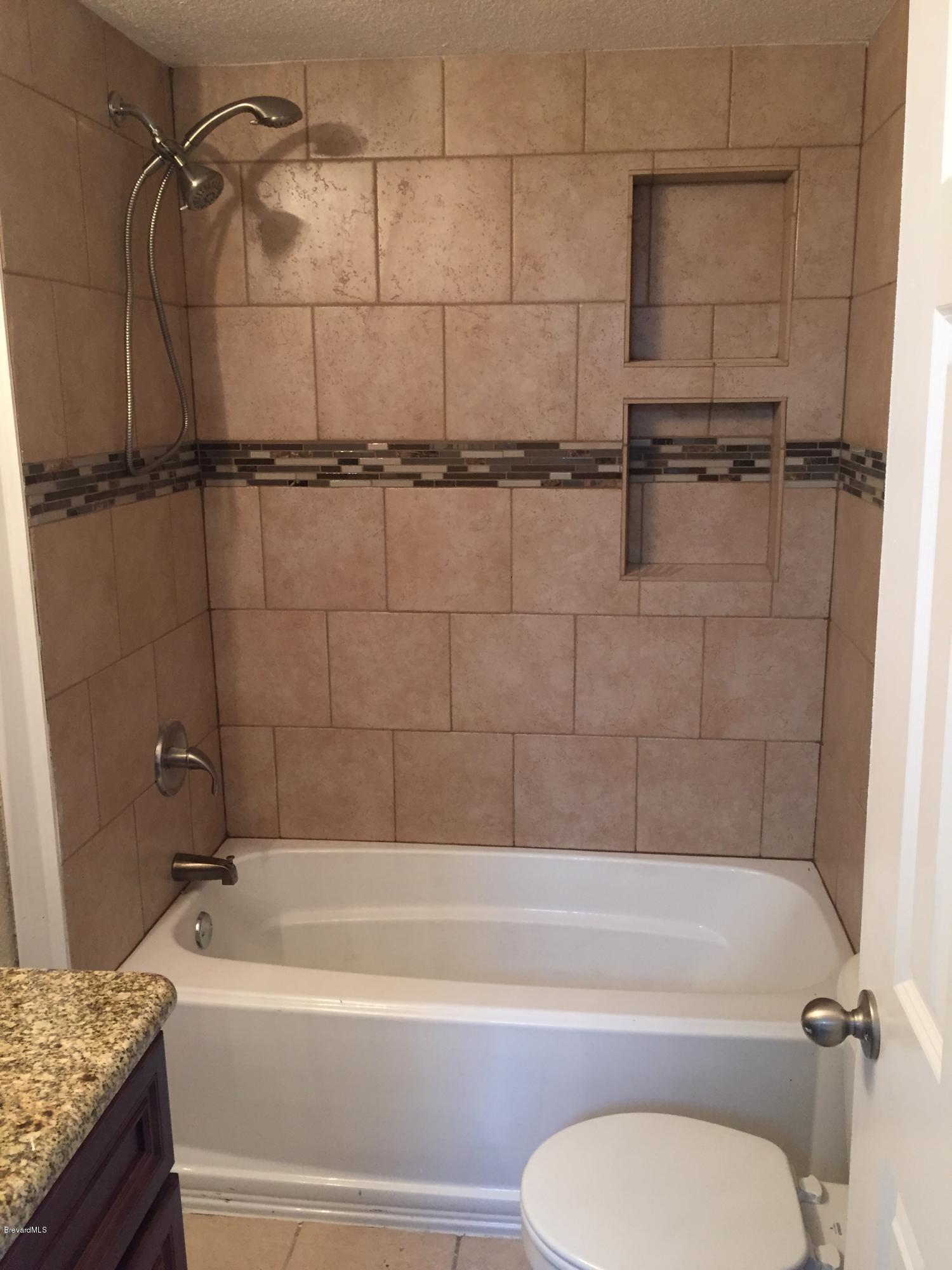 7407 Ester Road Cocoa, FL 32927 - Photo 19 of 31 upstairs bathroom shower