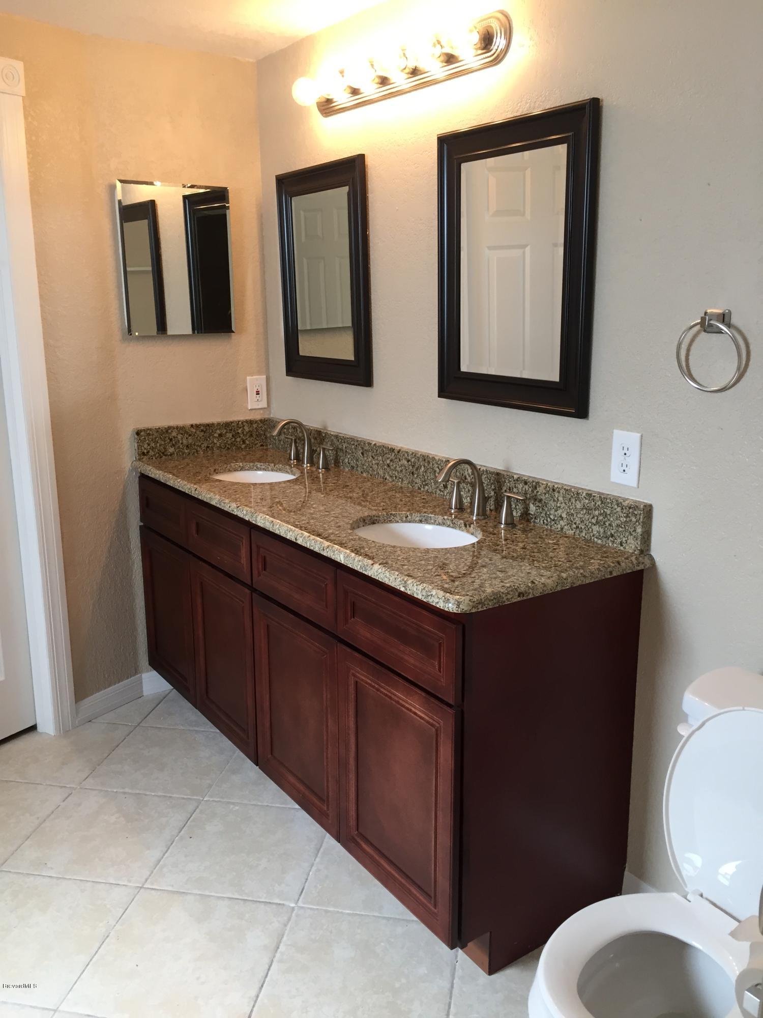 7407 Ester Road Cocoa, FL 32927 - Photo 9 of 31 Master bathroom sinks