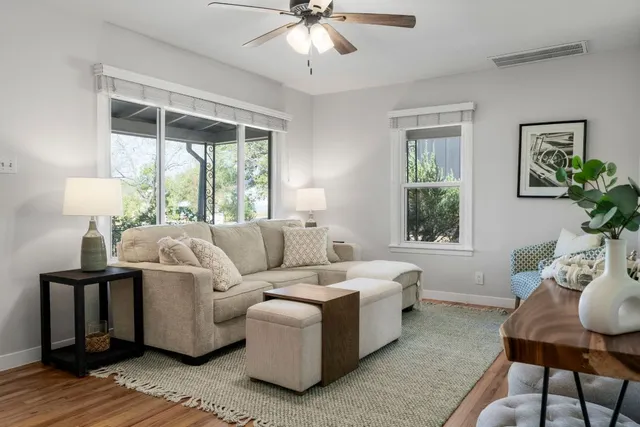 a living room with furniture and a window