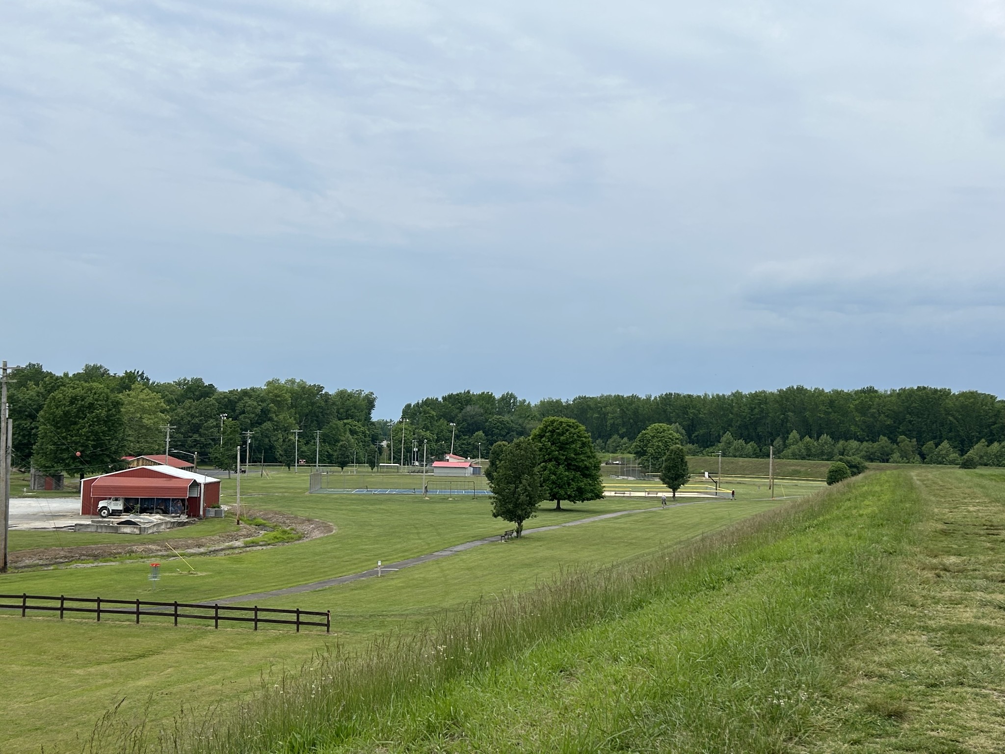 20 Ball Park Road Big Sandy, TN 38221 - Photo 14 of 33 a view of a golf course with a lake