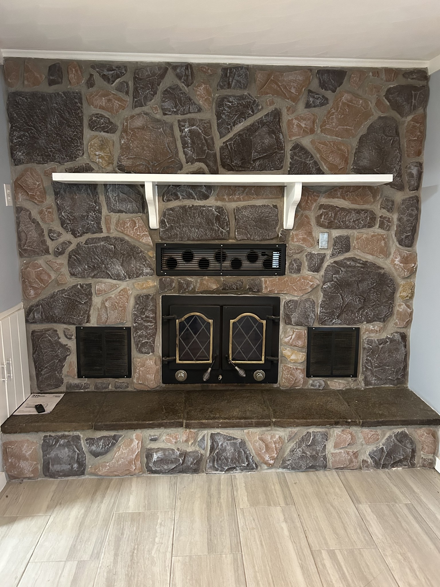 20 Ball Park Road Big Sandy, TN 38221 - Photo 21 of 33 a living room with a fireplace