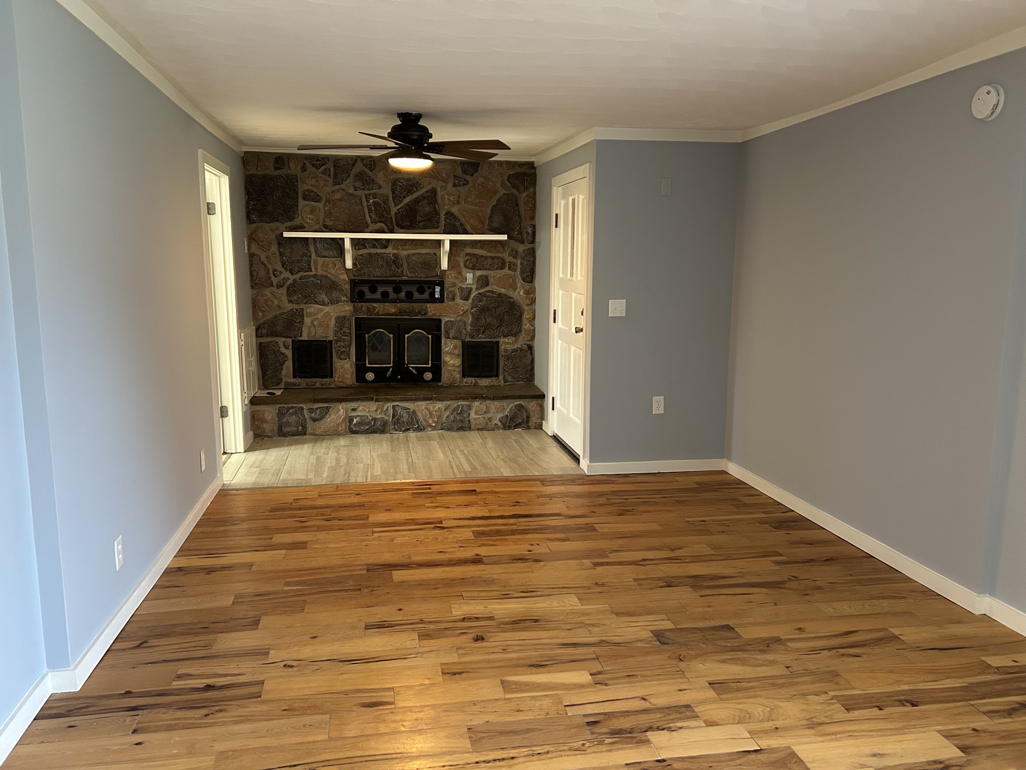 20 Ball Park Road Big Sandy, TN 38221 - Photo 22 of 33 a view of water heater room with wooden floor