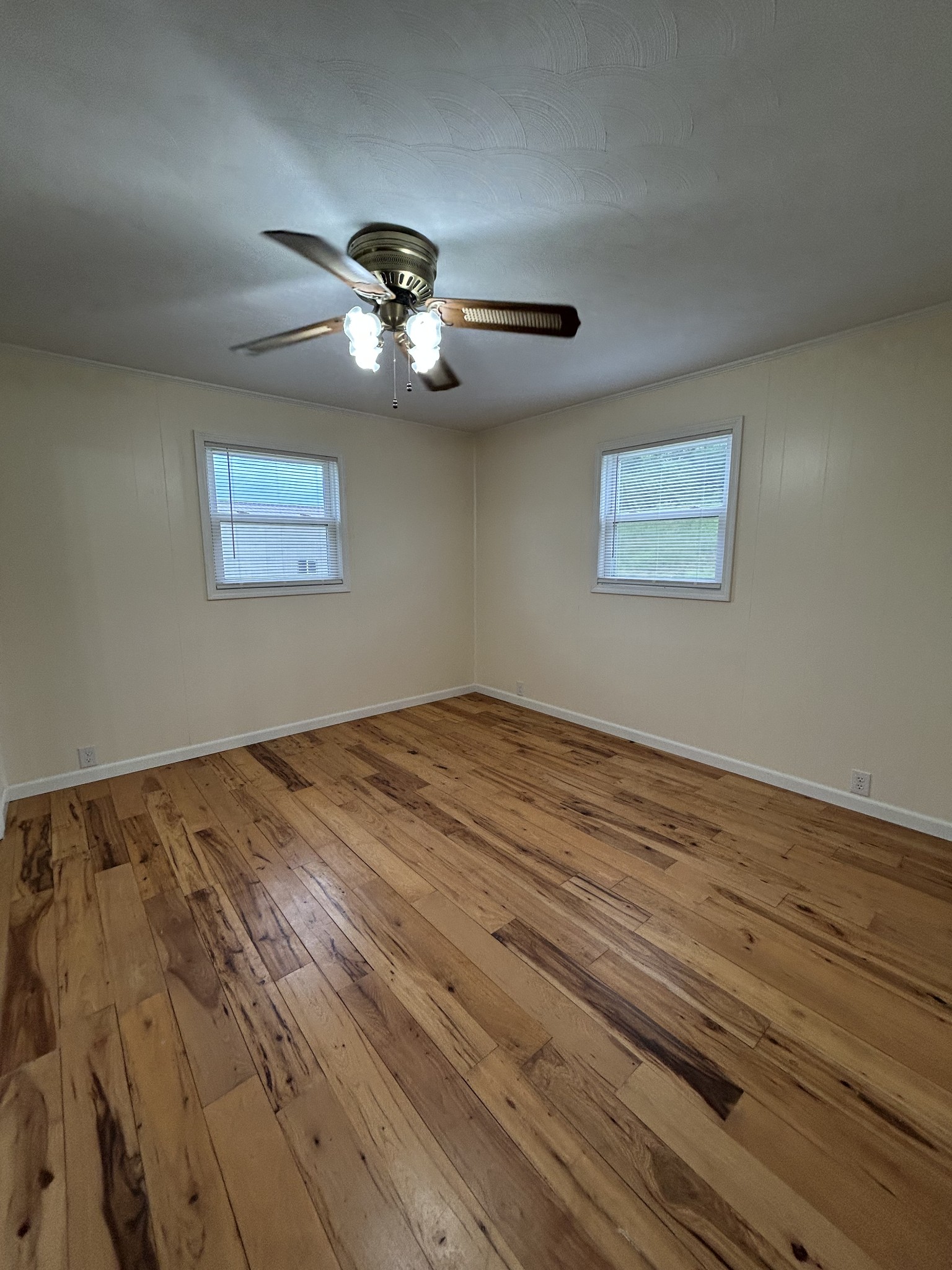 20 Ball Park Road Big Sandy, TN 38221 - Photo 26 of 33 a view of empty room with wooden floor