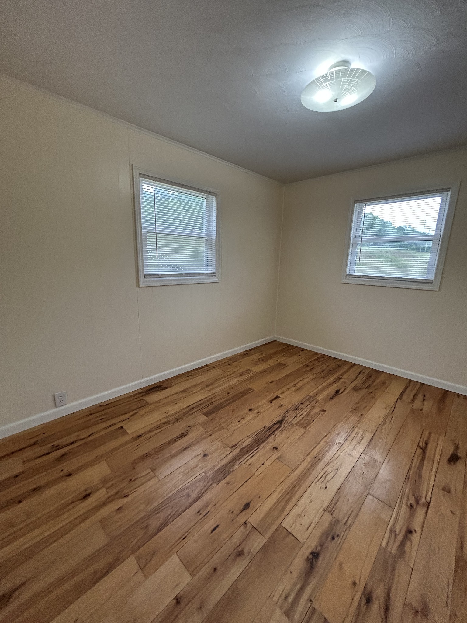 20 Ball Park Road Big Sandy, TN 38221 - Photo 27 of 33 a view of empty room with wooden floor
