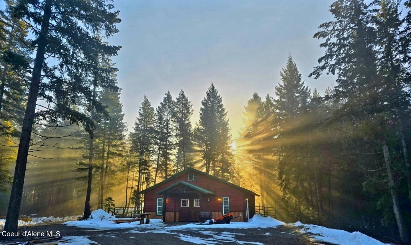 26864 North Timber Ridge Road Rathdrum, ID 83858 - Photo 11 of 12 barn with sun