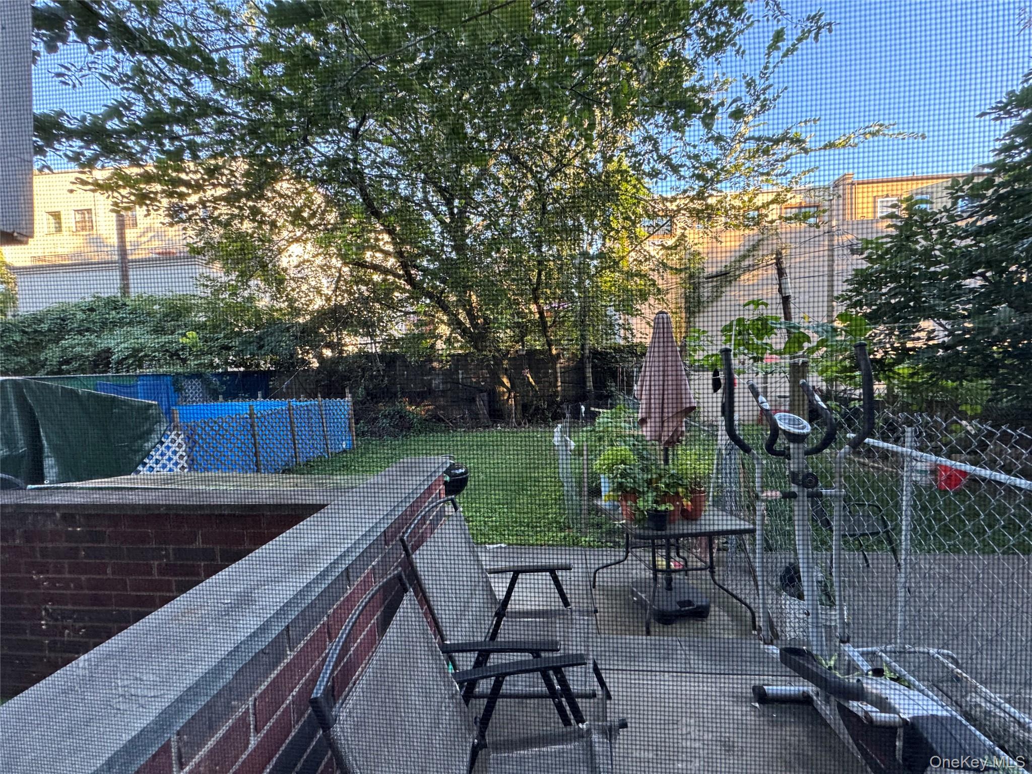101-20 39th Avenue Queens, NY 11368 - Photo 7 of 17 a view of a backyard with sitting area