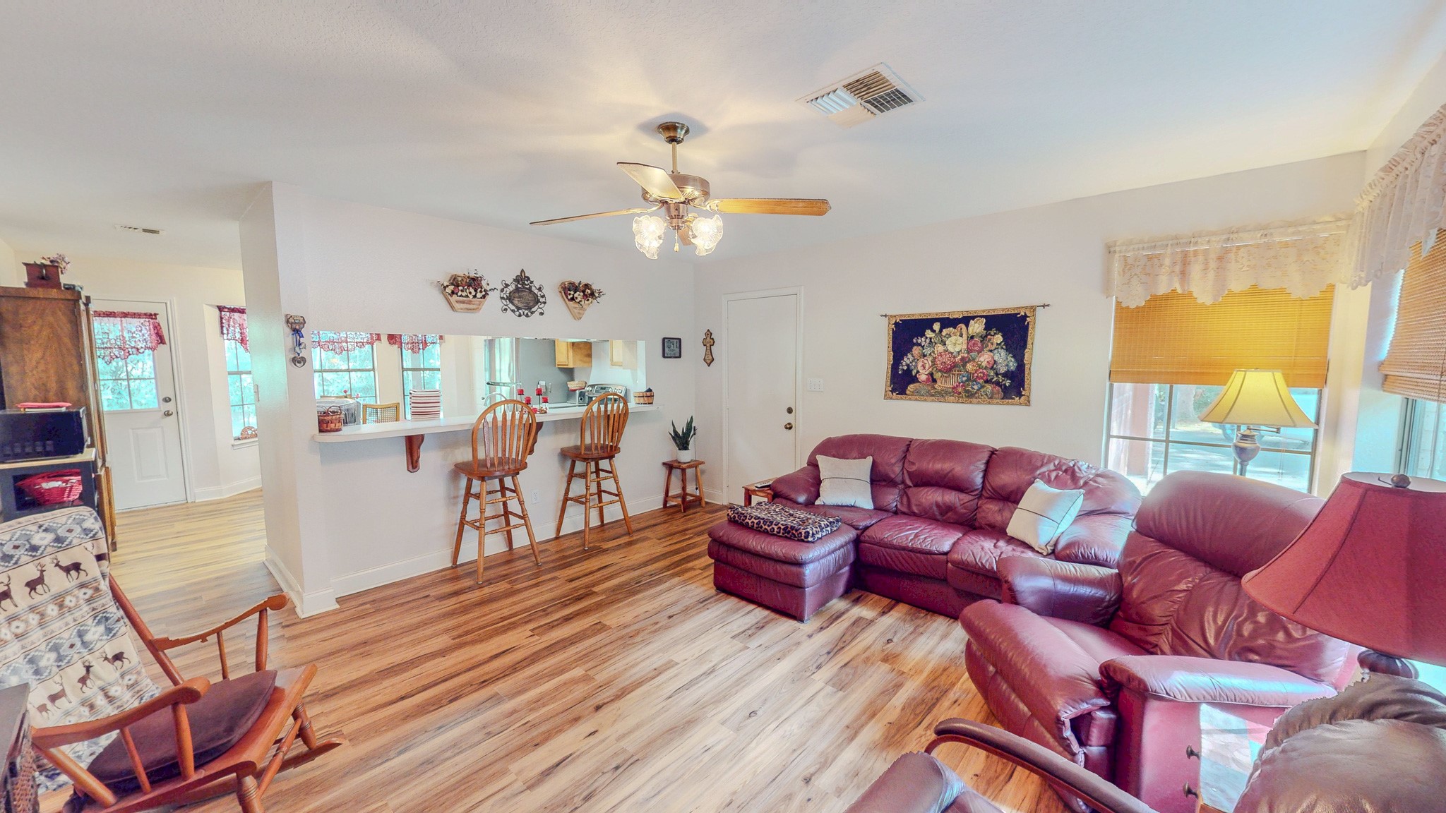 3504 FM 522 Road Brazoria, TX 77422 - Photo 11 of 40 a living room with lots of furniture and a chandelier