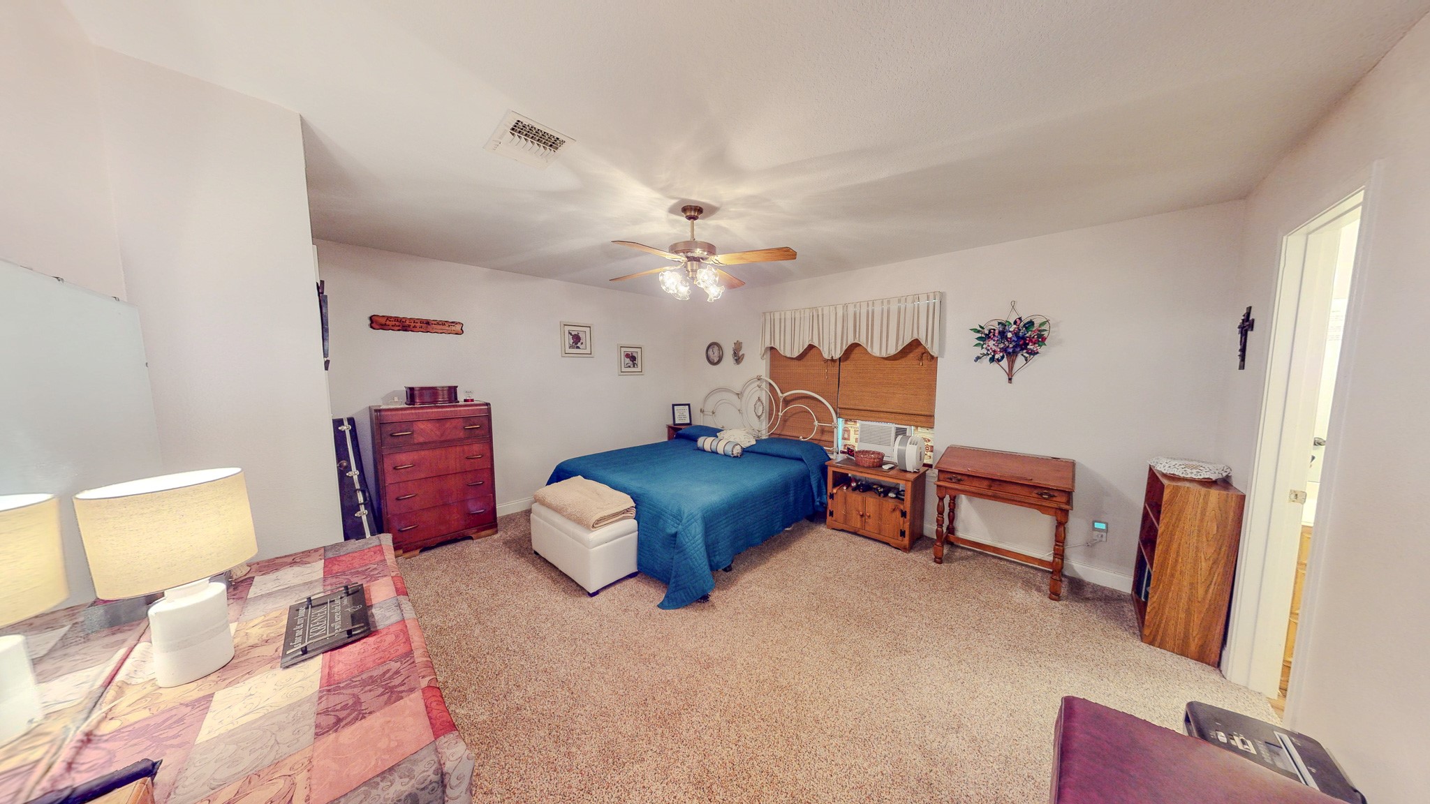 3504 FM 522 Road Brazoria, TX 77422 - Photo 15 of 40 a bed room with a bed and a chandelier