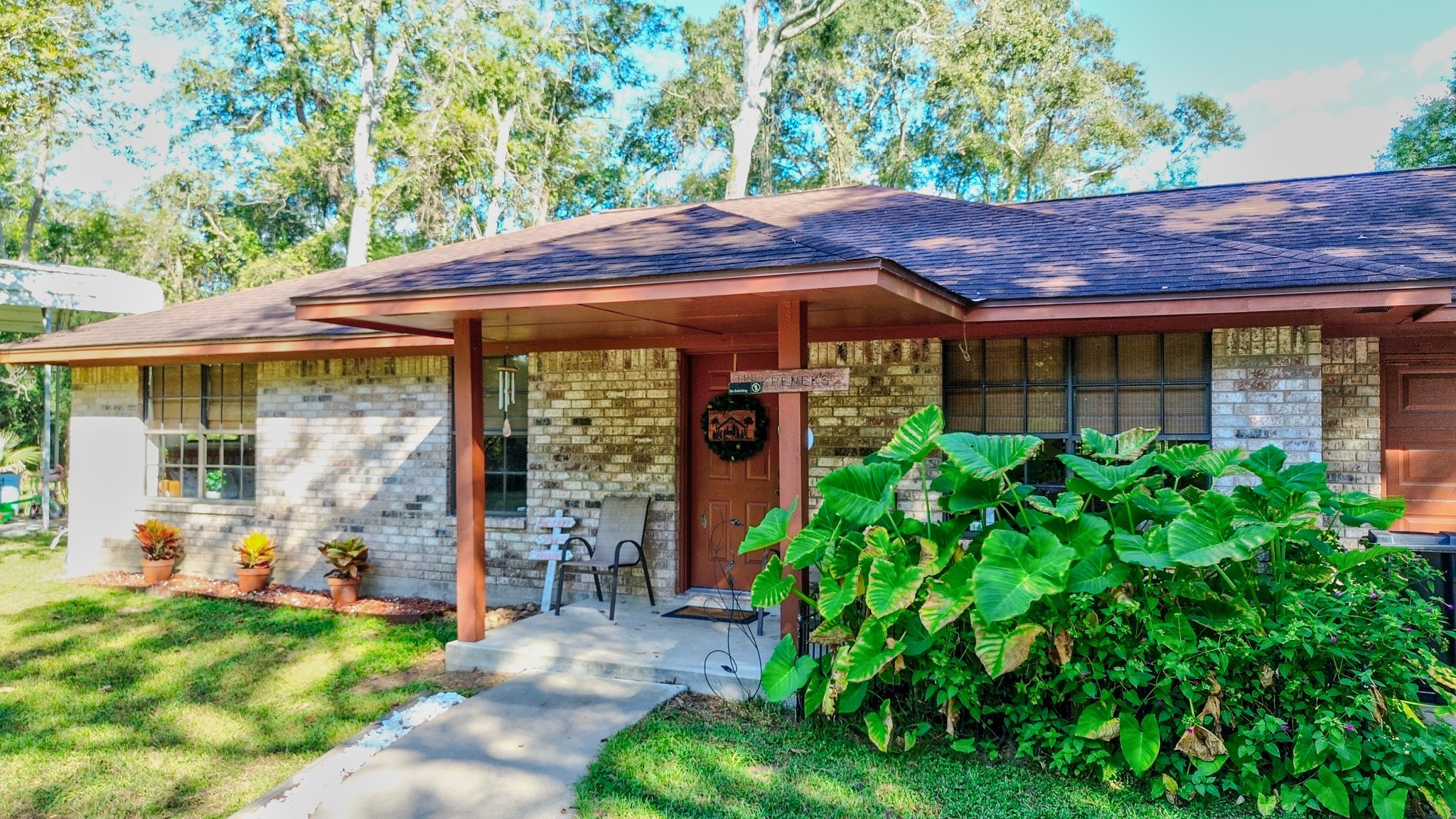3504 FM 522 Road Brazoria, TX 77422 - Photo 2 of 40 a front view of a house with garden