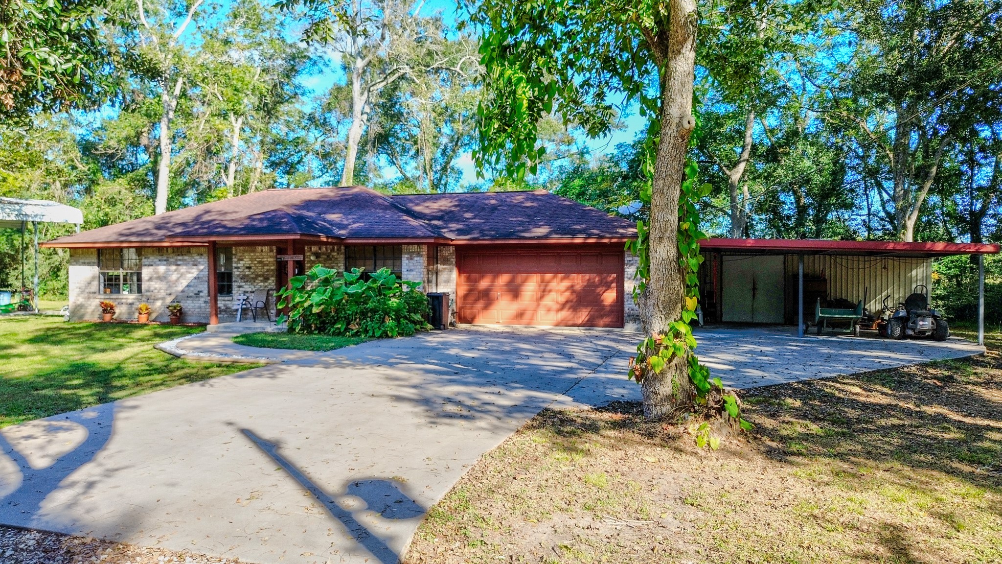 3504 FM 522 Road Brazoria, TX 77422 - Photo 38 of 40 a front view of a house with a yard and tree