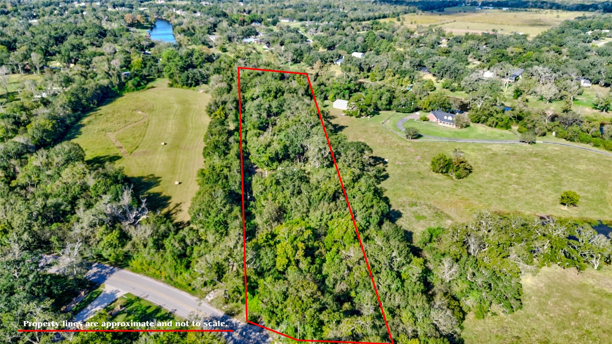 3504 FM 522 Road Brazoria, TX 77422 - Photo 4 of 40 an aerial view of a residential houses with yard and swimming pool