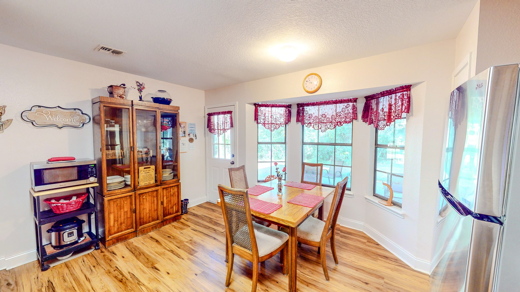3504 FM 522 Road Brazoria, TX 77422 - Photo 8 of 40 a view of a dining room with furniture window and wooden floor