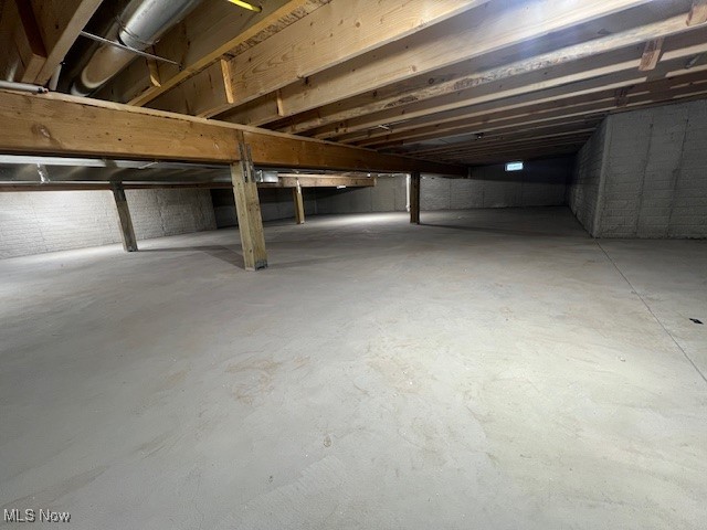 1775 Green Road Madison, OH 44057 - Photo 43 of 46 Crawl Space with nice depth, interior & exterior drain tile, sump pump with back-up and LED lighting