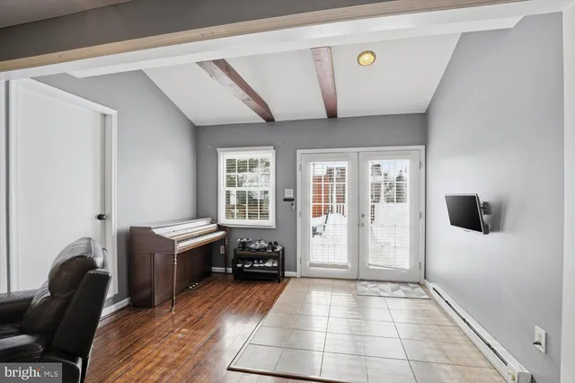 a view of a livingroom with furniture and windows