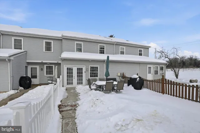 a view of a big room with a mountain view