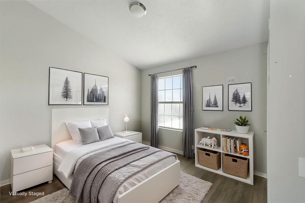 1019 Danforth Court Arlington, TX 76017 - Photo 26 of 37 a bedroom with a bed and a window