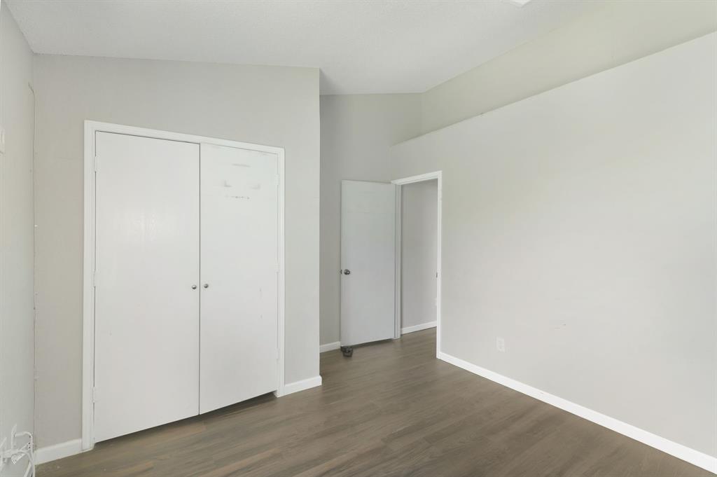 1019 Danforth Court Arlington, TX 76017 - Photo 29 of 37 a view of an empty room with wooden floor