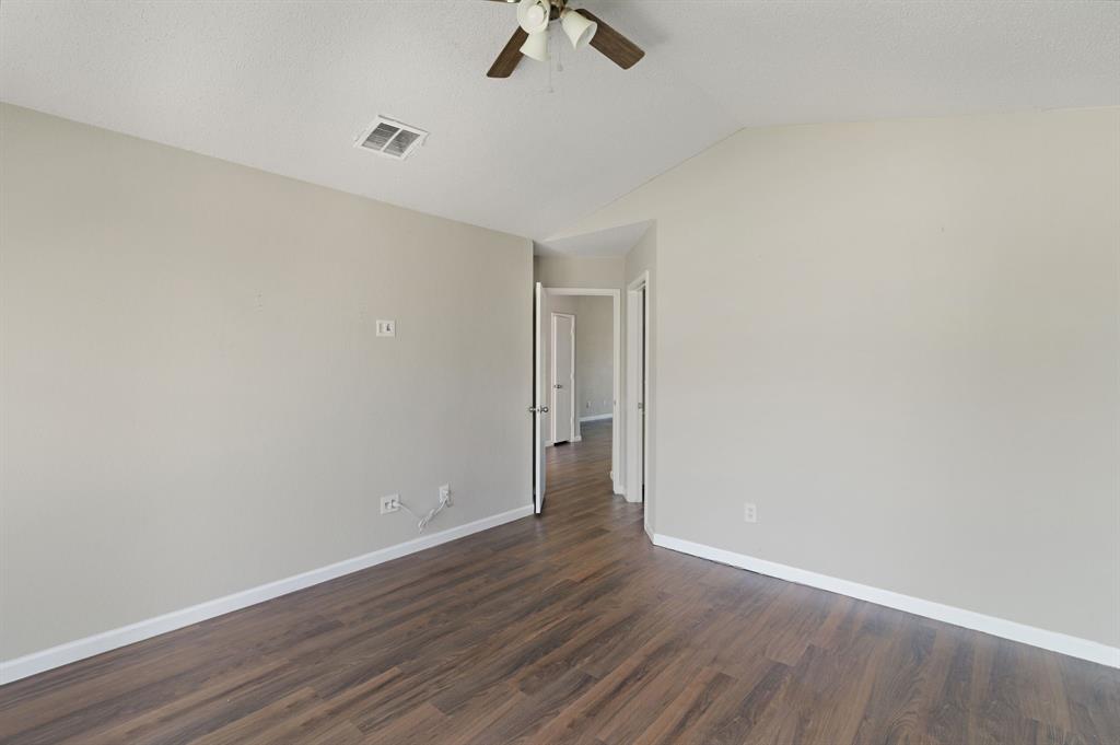 1019 Danforth Court Arlington, TX 76017 - Photo 31 of 37 a view of an empty room with wooden floor