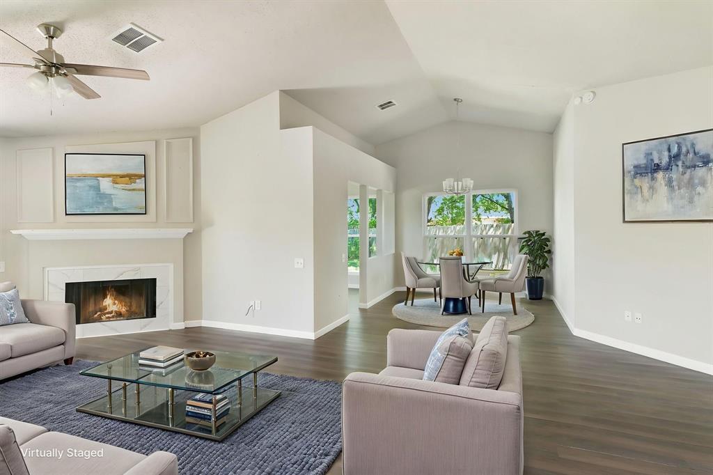1019 Danforth Court Arlington, TX 76017 - Photo 6 of 37 a living room with furniture and a fireplace