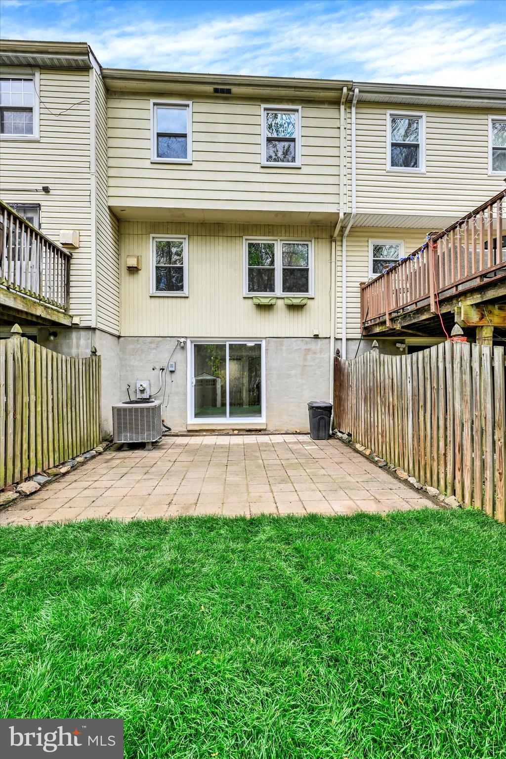 3447 Santee Road Baltimore, MD 21236 - Photo 28 of 32 a front view of a house with a yard and porch
