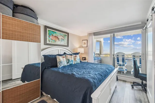 a bedroom with a bed and a walk in closet