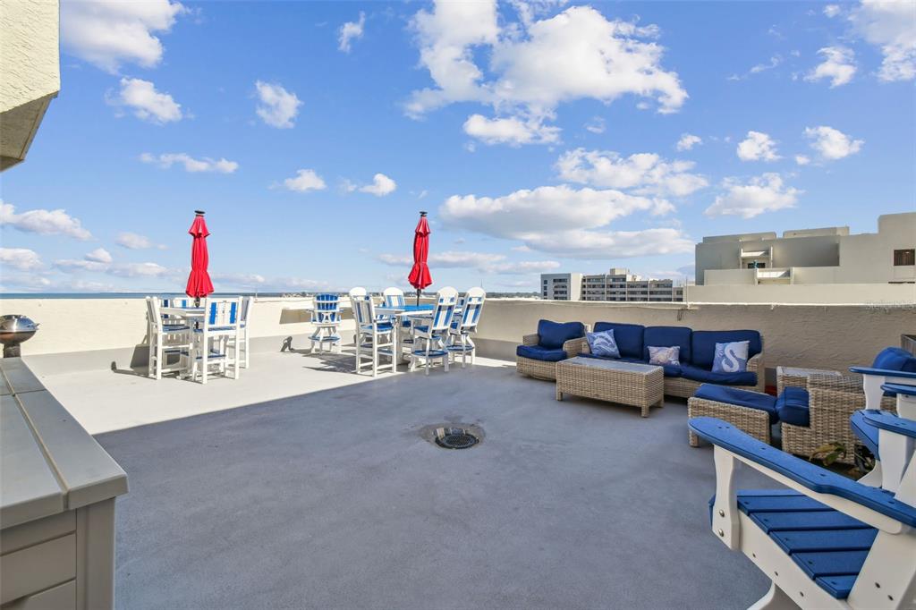 5915 Sea Ranch Drive, Unit 703 Hudson, FL 34667 - Photo 48 of 54 a view of swimming pool with outdoor seating