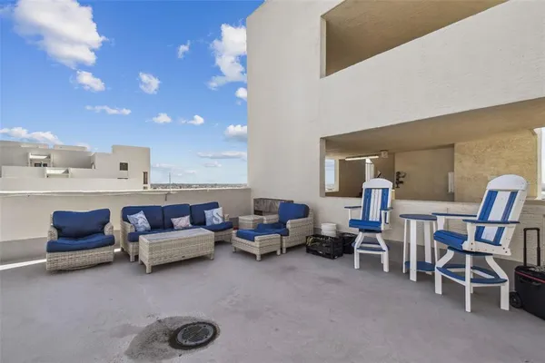 a view of an ocean and city