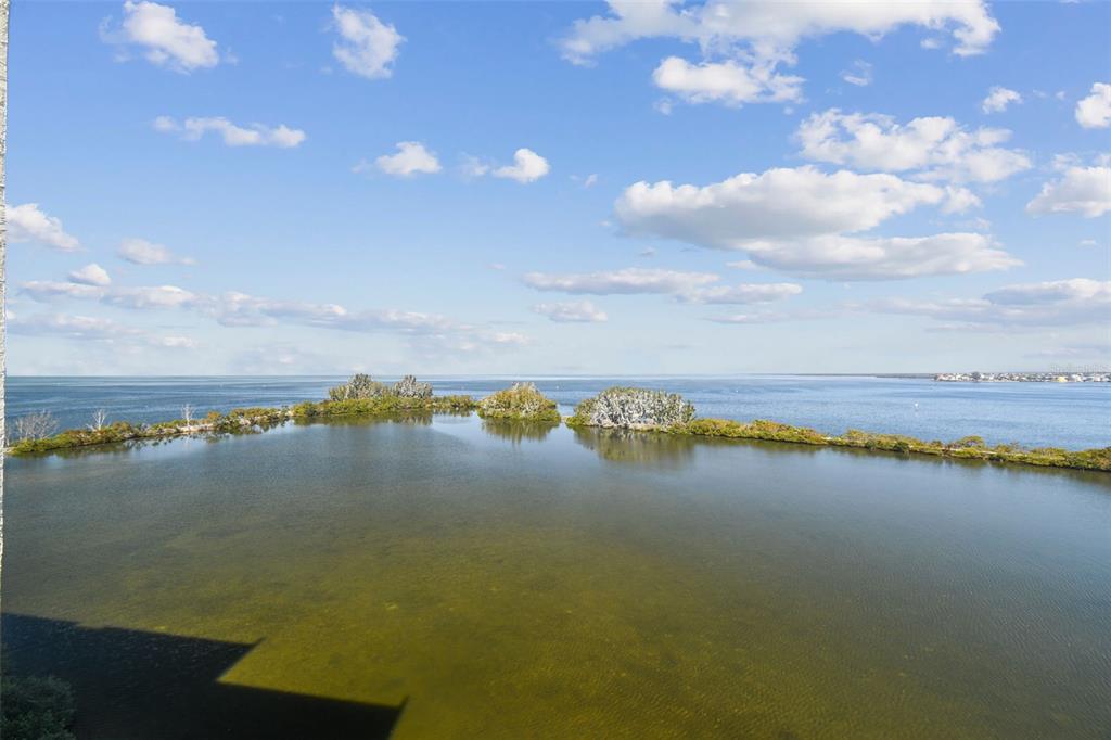 5915 Sea Ranch Drive, Unit 703 Hudson, FL 34667 - Photo 53 of 54 a view of an ocean and city