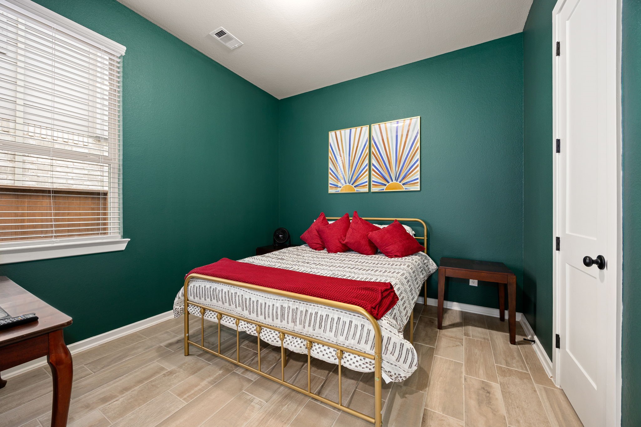 4823 Vaughan Way Iowa Colony, TX 77583 - Photo 18 of 29 a bedroom with a bed and a window