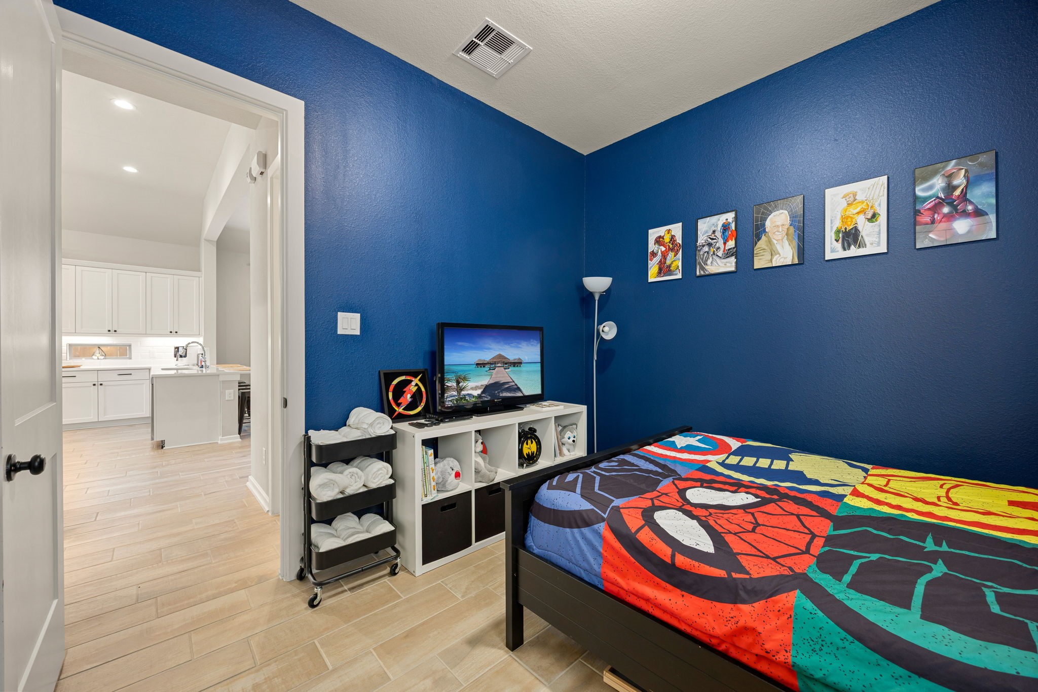 4823 Vaughan Way Iowa Colony, TX 77583 - Photo 21 of 29 a bedroom with a bed and a view of kitchen