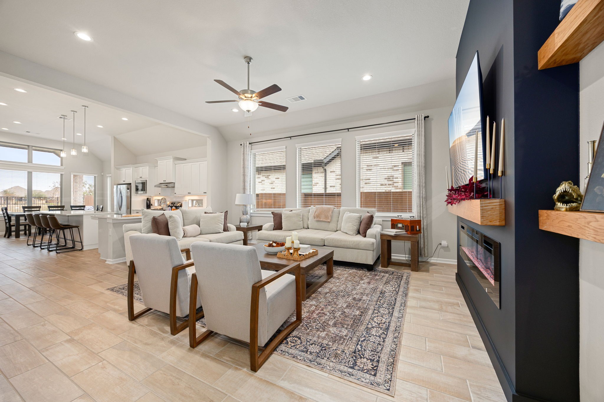 4823 Vaughan Way Iowa Colony, TX 77583 - Photo 6 of 29 a living room with furniture fireplace and a window