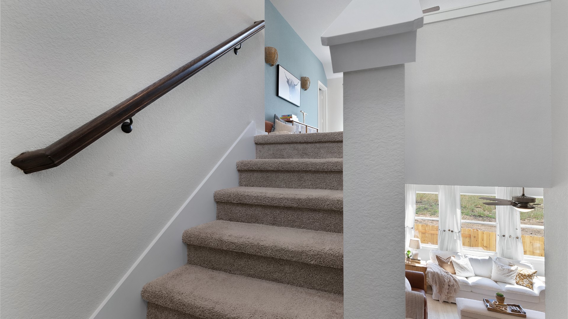 25812 Jasmine Sprig Lane Elgin, TX 78621 - Photo 18 of 33 A plush carpeted staircase invites you to explore the upper level of this residence.
