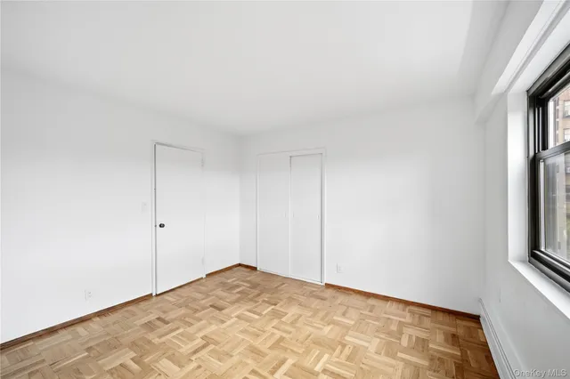 a view of empty room with windows