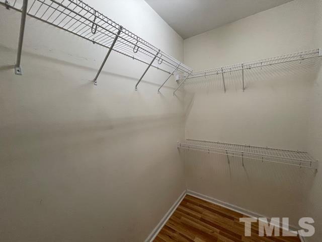 1007 Willowedge Court Knightdale, NC 27545 - Photo 13 of 21 a view of a room with racks on the wall