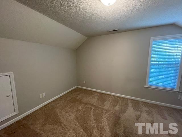 1007 Willowedge Court Knightdale, NC 27545 - Photo 20 of 21 an empty room with a window