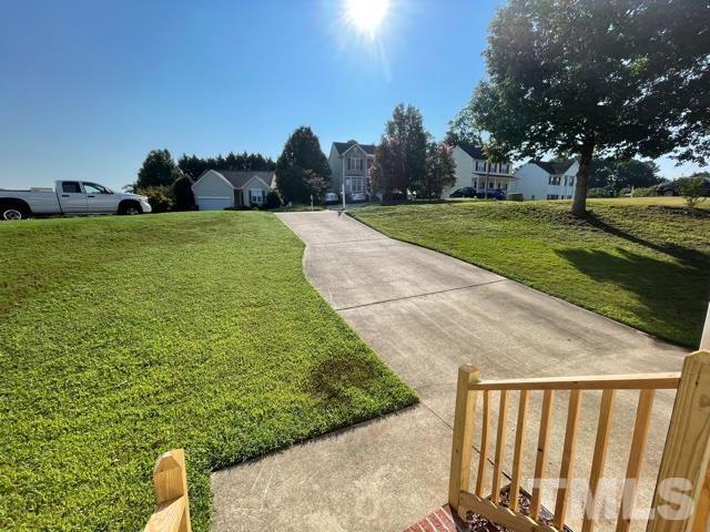 1007 Willowedge Court Knightdale, NC 27545 - Photo 2 of 21 a view of a garden with an outdoor space