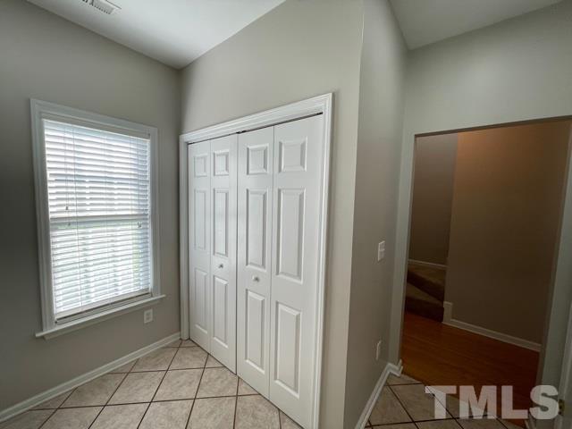 1007 Willowedge Court Knightdale, NC 27545 - Photo 6 of 21 an empty room with windows