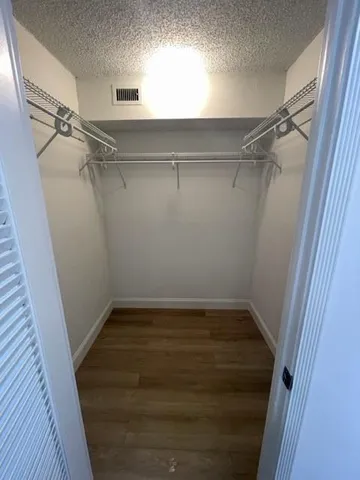 a view of a room with racks on the wall