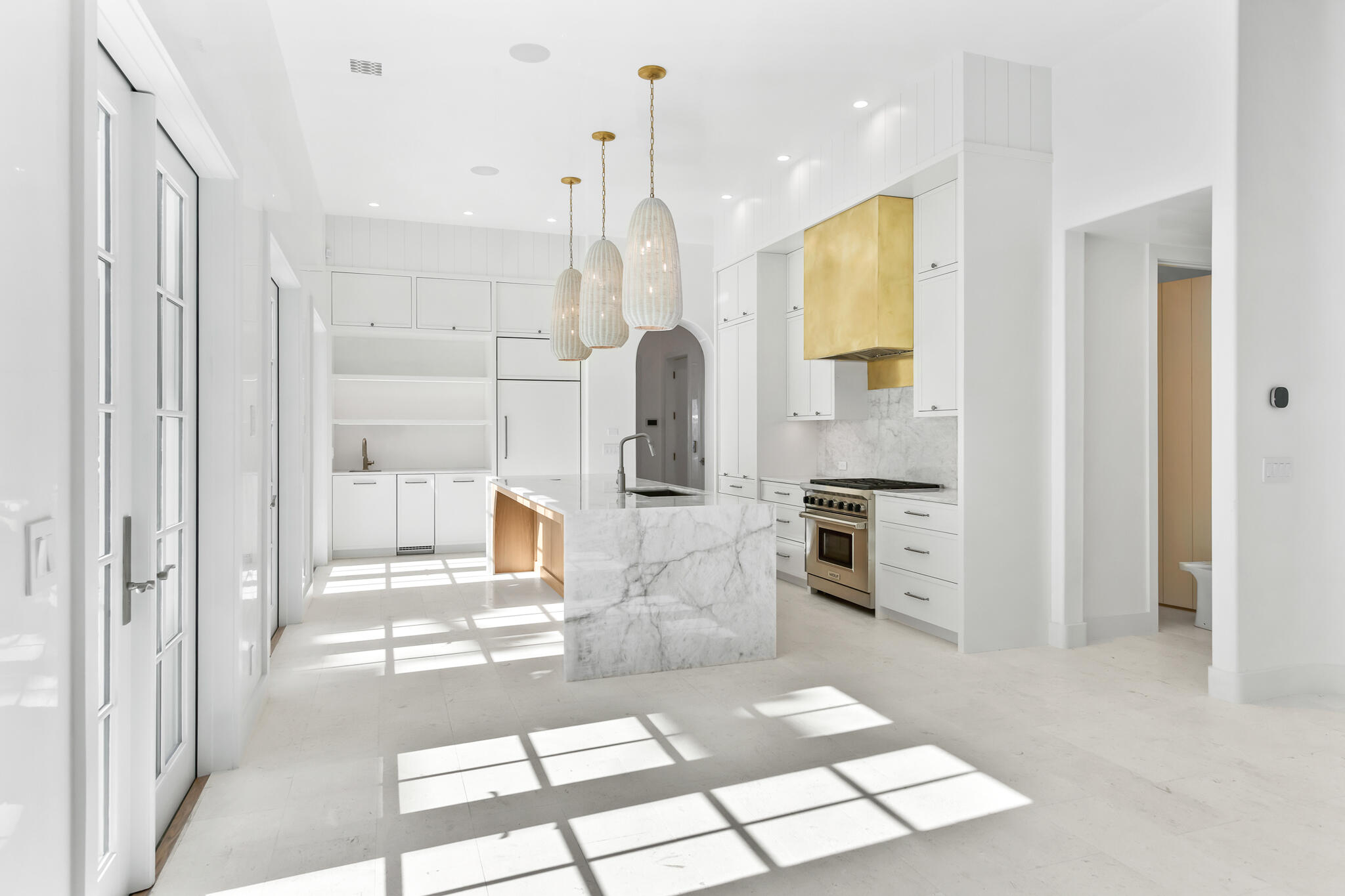 26 Sea Garden St Inlet Beach Inlet Beach, FL 32461 - Photo 12 of 51 a open kitchen with stainless steel appliances kitchen island granite countertop a refrigerator and a stove top oven