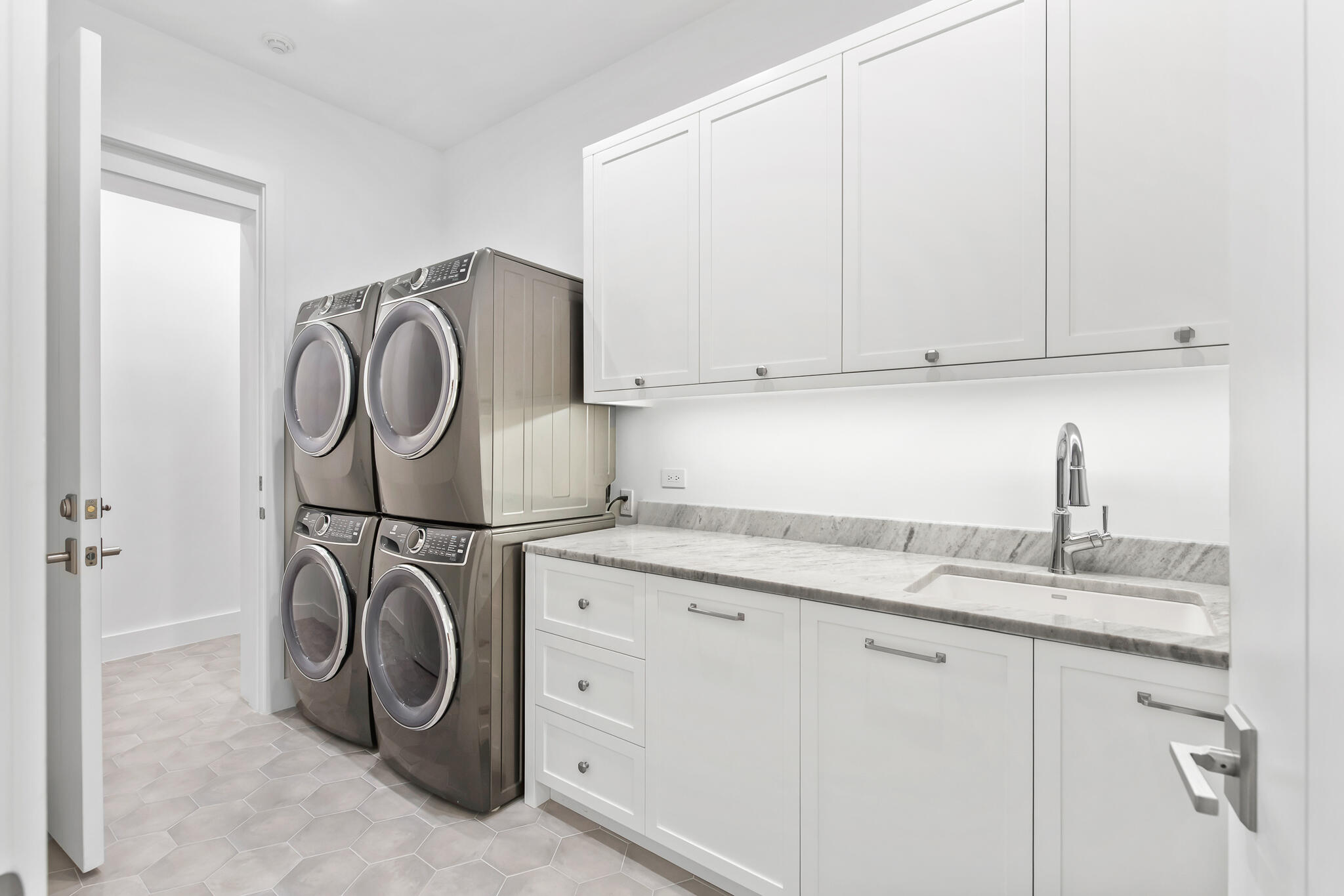 26 Sea Garden St Inlet Beach Inlet Beach, FL 32461 - Photo 21 of 51 a utility room with sink dryer and washer