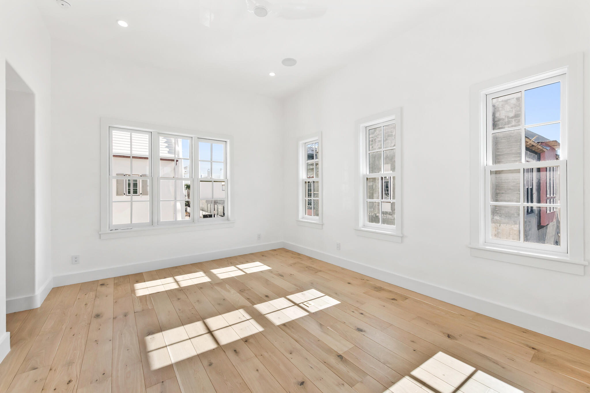 26 Sea Garden St Inlet Beach Inlet Beach, FL 32461 - Photo 22 of 51 a view of empty room with wooden floor and fan