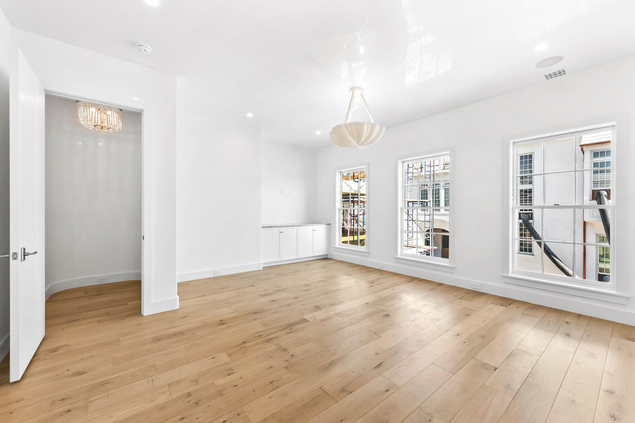 26 Sea Garden St Inlet Beach Inlet Beach, FL 32461 - Photo 23 of 51 a view of an empty room with window and wooden floor